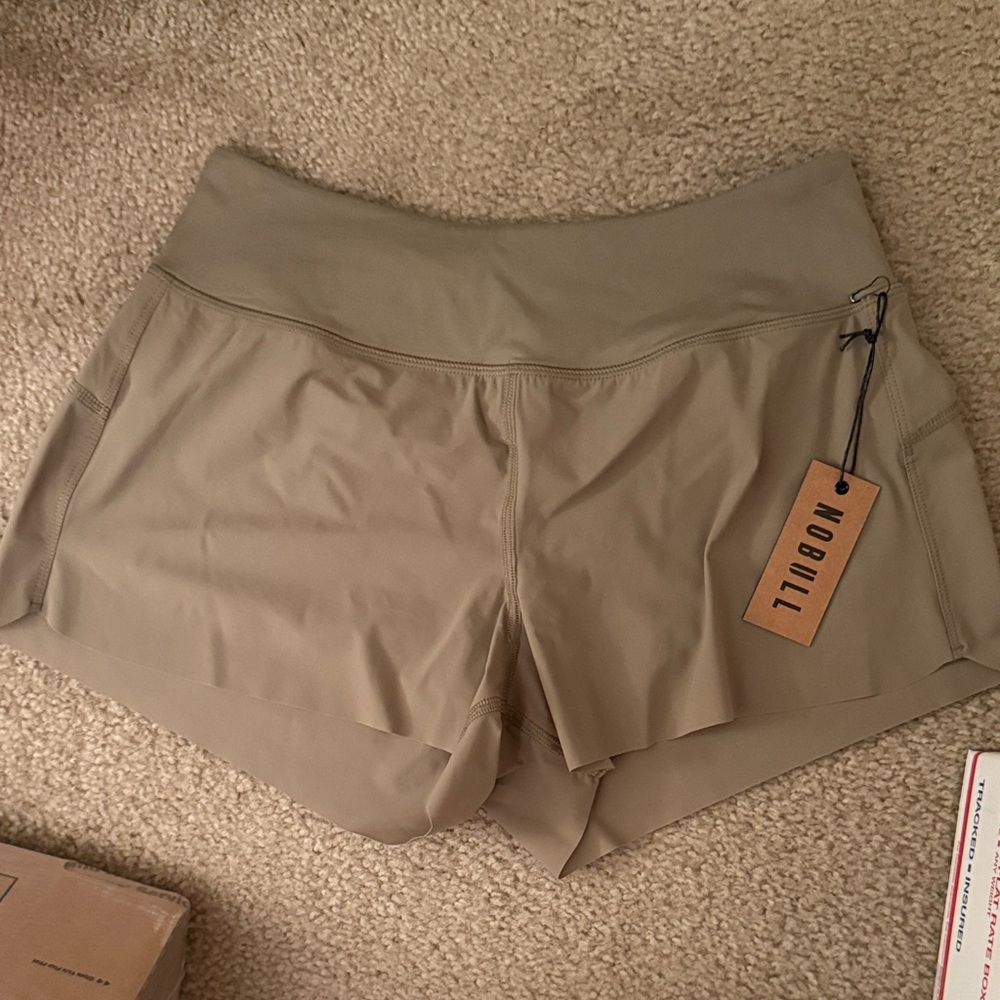 NOBULL Women's Athletic Shorts- NWT Size Small tan/olive color